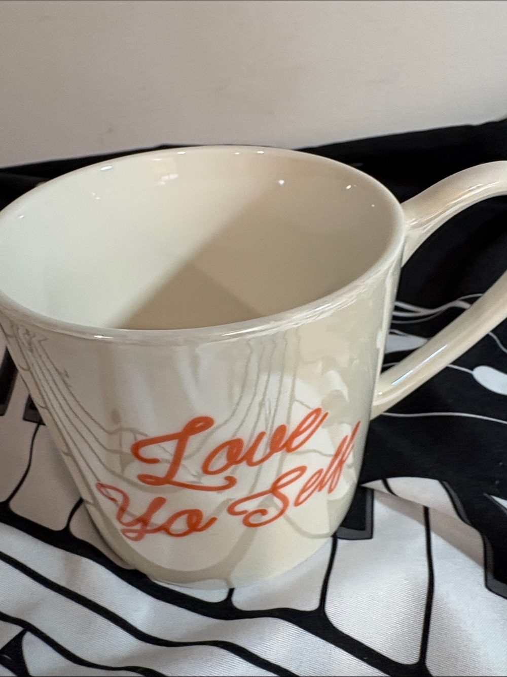 White Ceramic Mug with Orange "Love Yo Self" Script